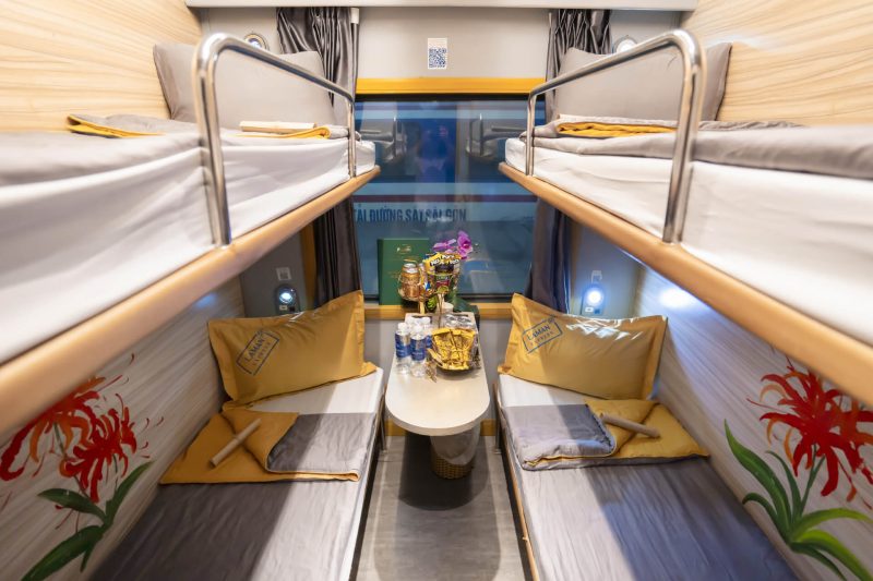 Luxurious cabin interior with leather seats and modern amenities on the Laman Express Train Hanoi to Lao Cai Sapa