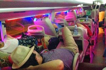 Sleeping bus interior with leather seats and modern amenities on the Dragon Sleeping bus from Hanoi to Sapa