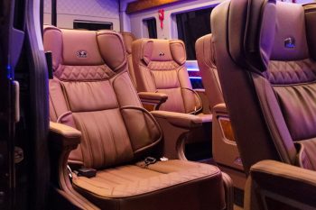 Luxurious Limousine van 10 seats interior with leather seats and modern amenities on the Sapa King Limousine company from Hanoi to Sapa