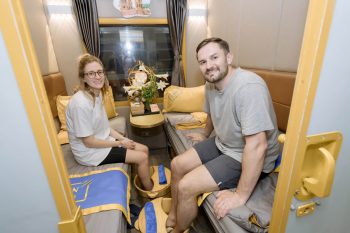 Luxurious cabin interior with leather seats and modern amenities on the Laman Express Train Hanoi to Lao Cai Sapa
