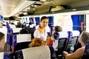 Luxco Travels bus service from Hanoi to Cat Ba with friendly staff and comfortable seating.