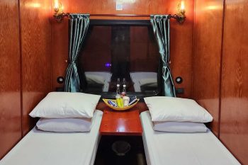 Luxurious cabin interior with leather seats and modern amenities on the Vic Express Train Hanoi to Lao Cai Sapa