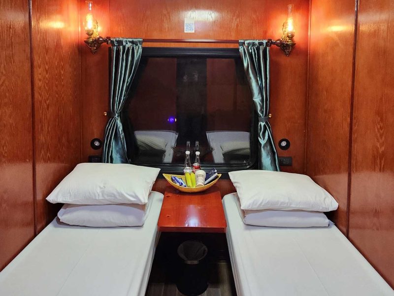 Luxurious cabin interior with leather seats and modern amenities on the Vic Express Train Hanoi to Lao Cai Sapa