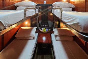 Luxurious cabin interior with leather seats and modern amenities on the Vic Express Train Hanoi to Lao Cai Sapa