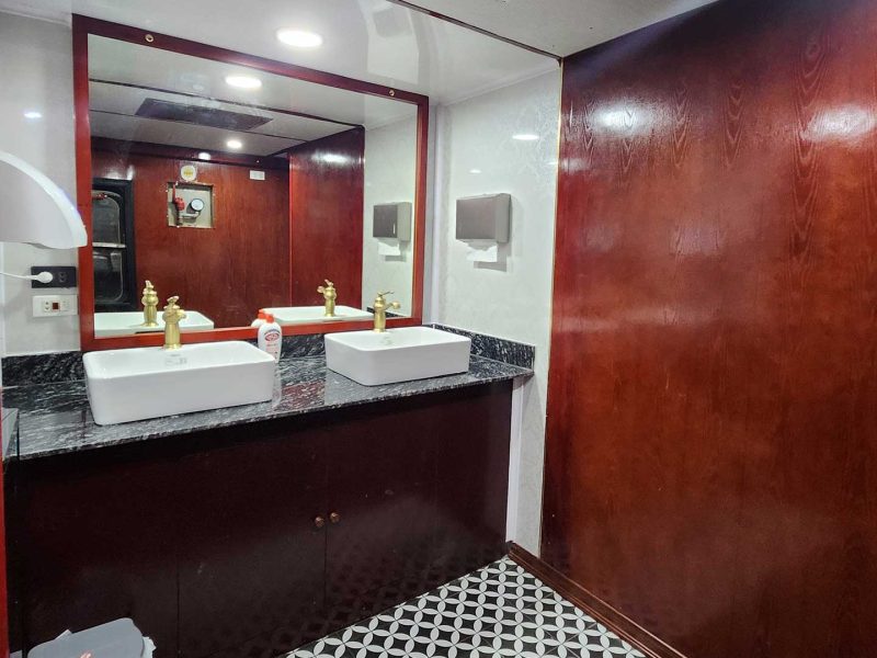 Luxurious cabin interior with leather seats and modern amenities on the Vic Express Train Hanoi to Lao Cai Sapa