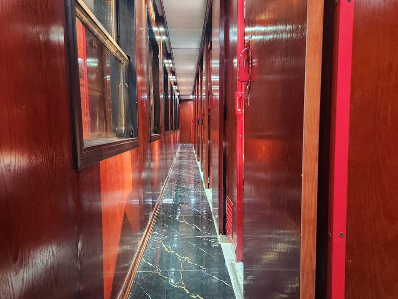 Luxurious cabin interior with leather seats and modern amenities on the Vic Express Train Hanoi to Lao Cai Sapa