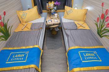 Luxurious cabin interior with leather seats and modern amenities on the Laman Express Train Hanoi to Lao Cai Sapa