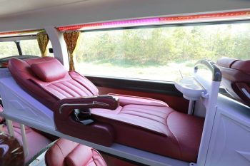 Sleeping bus interior with leather seats and modern amenities on the Dragon Sleeping bus from Hanoi to Sapa